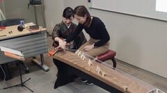 140085